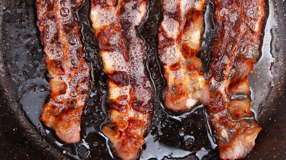 Closeup of four strips of bacon