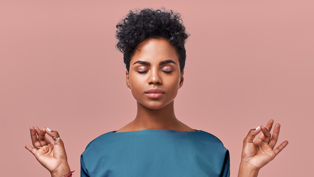 Calm woman meditating