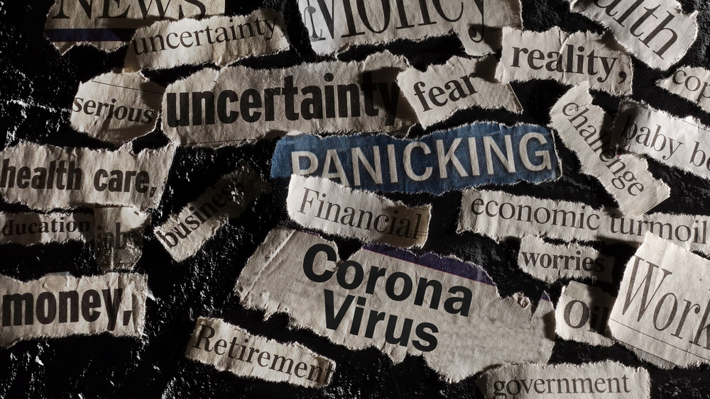 Stress related words torn from newspaper headlines