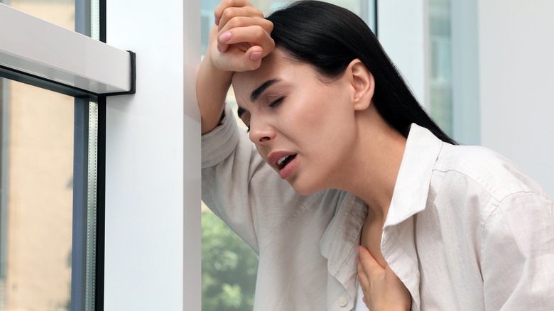 Woman head chest pain