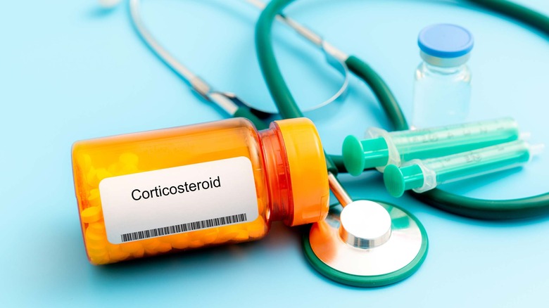 Corticosteroid tablets, stethoscope, syringes, vial