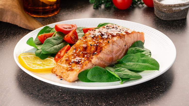 Cooked salmon on a salad