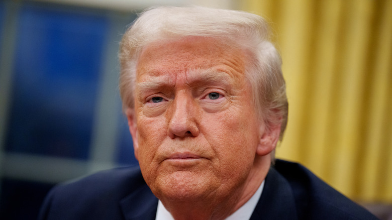 President Donald Trump takes a question from a reporter in the Oval office