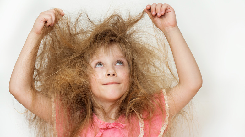 child with frizzy hair