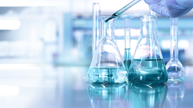 Close up shot of a table in a chemist's lab