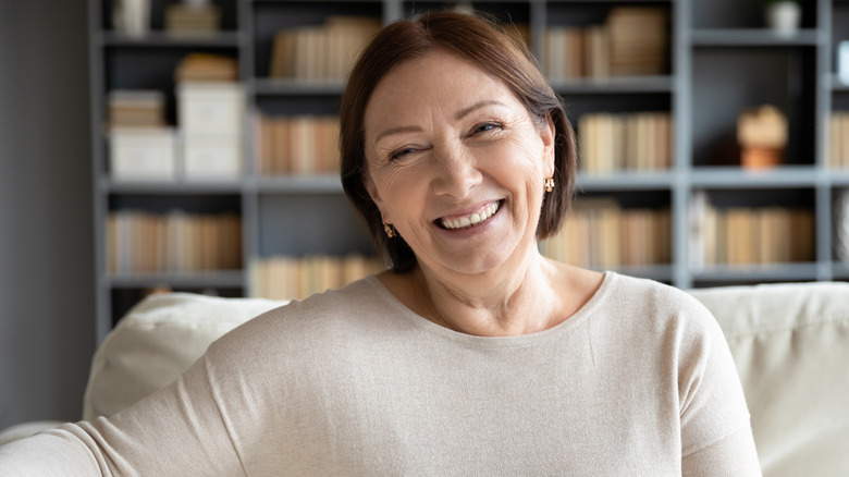 Woman smiling on couch