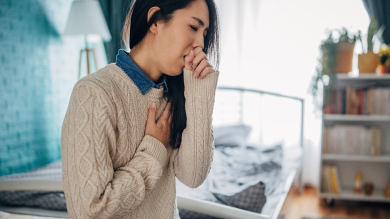 Woman coughing