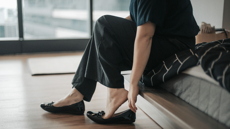 Woman wearing shoes on feet