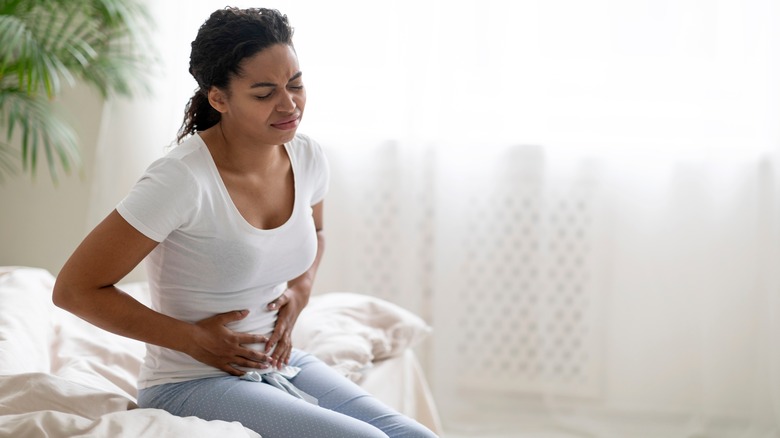 Woman with stomach pain