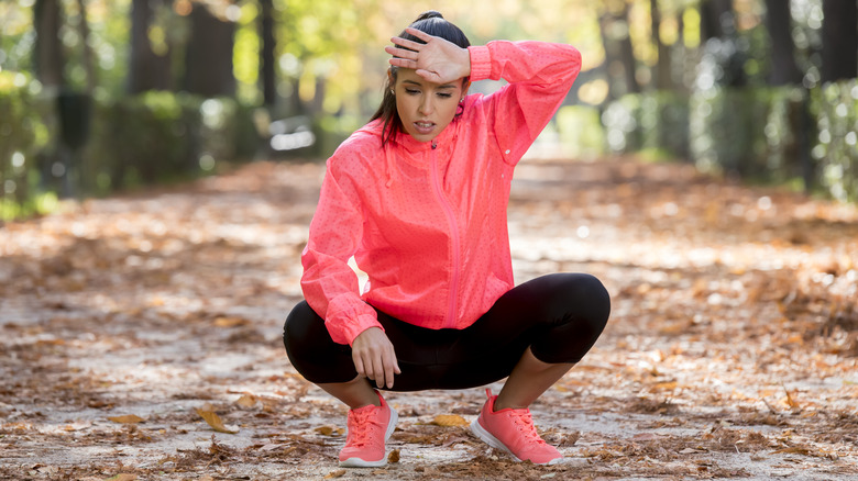 woman exhausted while exercising