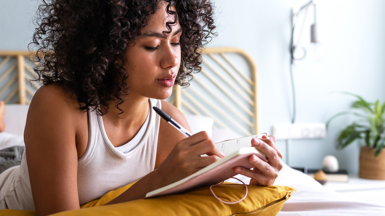 Woman journaling about dreams