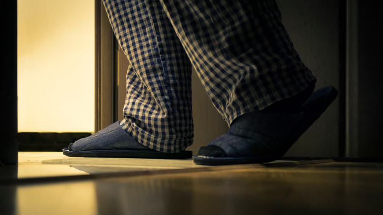 Feet in slippers walking