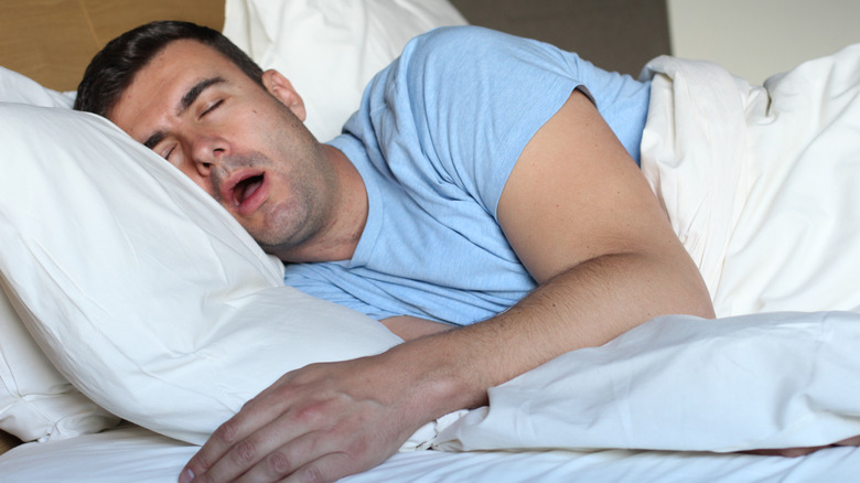 man sleeping with his mouth open