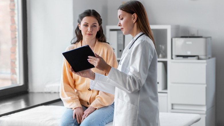 doctor consulting with patient