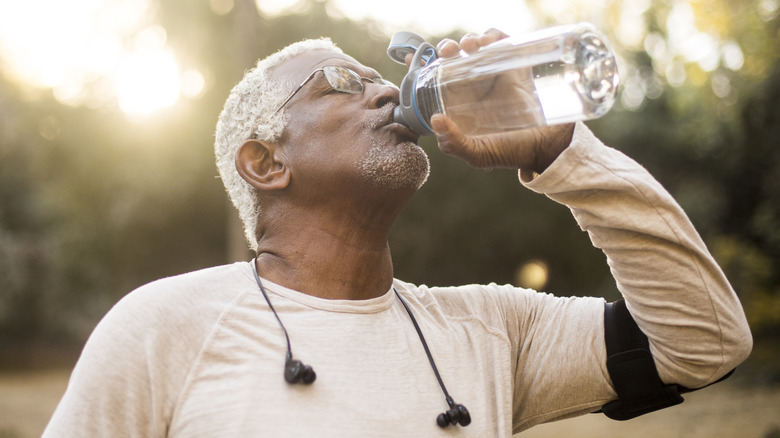 Man drinking water bottle