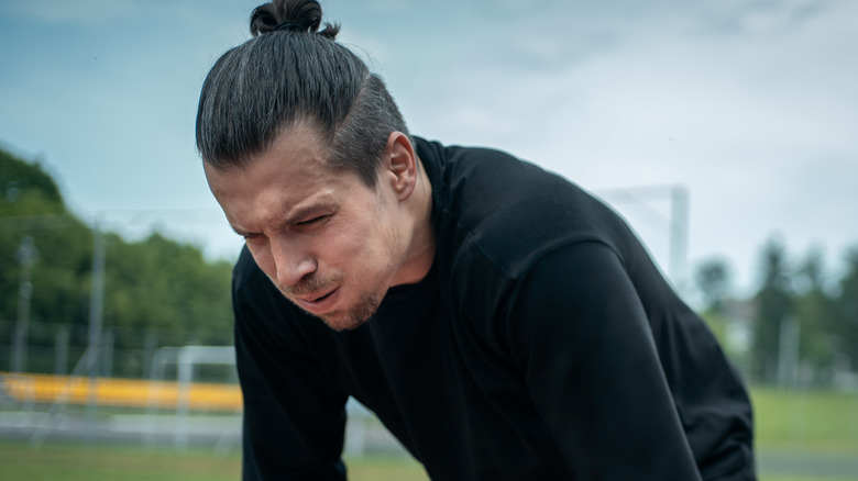 tired man at the track