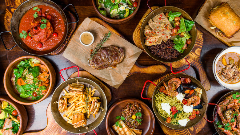 Full table spread of various dishes