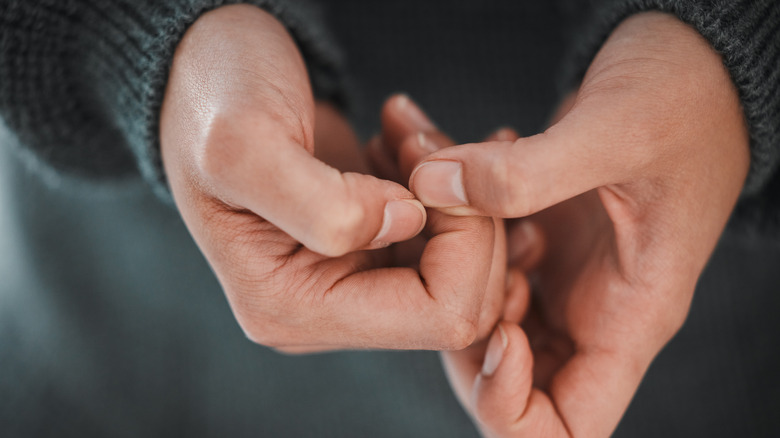 Man pressing his fingers