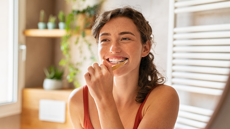 Girl brushing her teeth