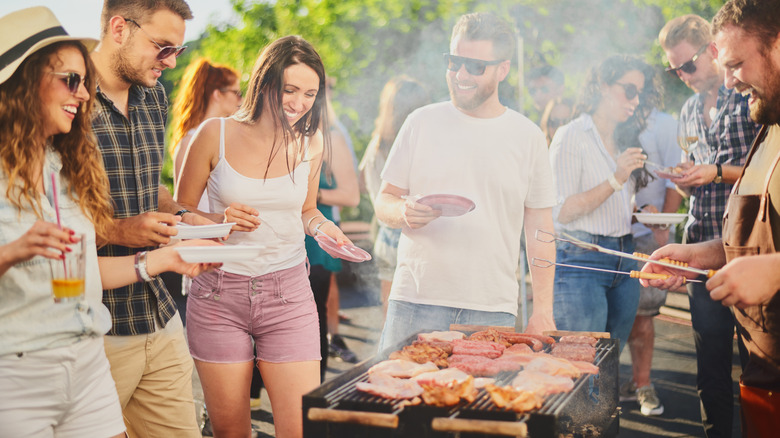 friends eating meat