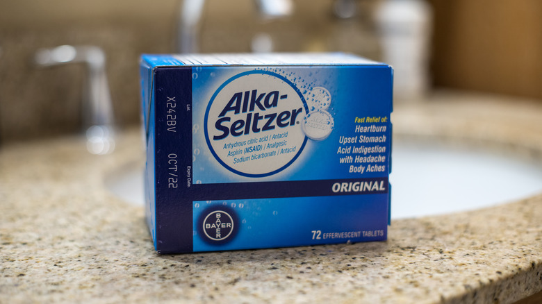 A box of Alka-Seltzer tablets near a sink