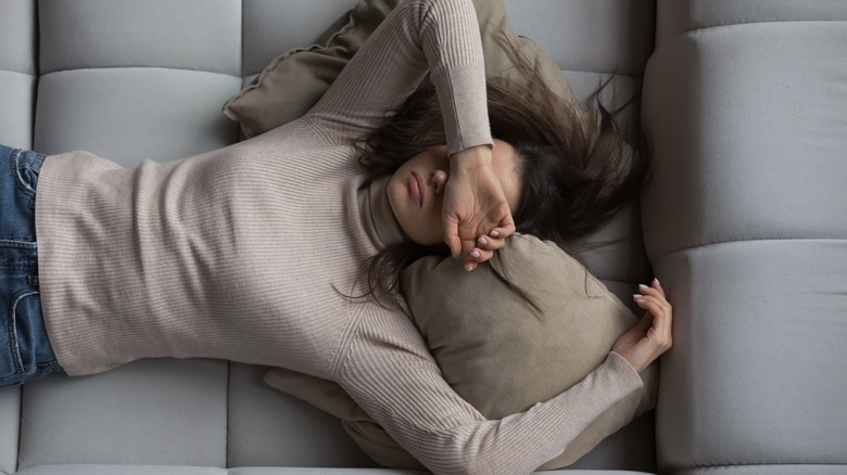 Woman sleeping on her back