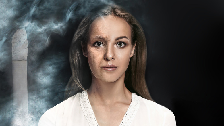 Concept of premature aging resulting from smoking on a young woman 