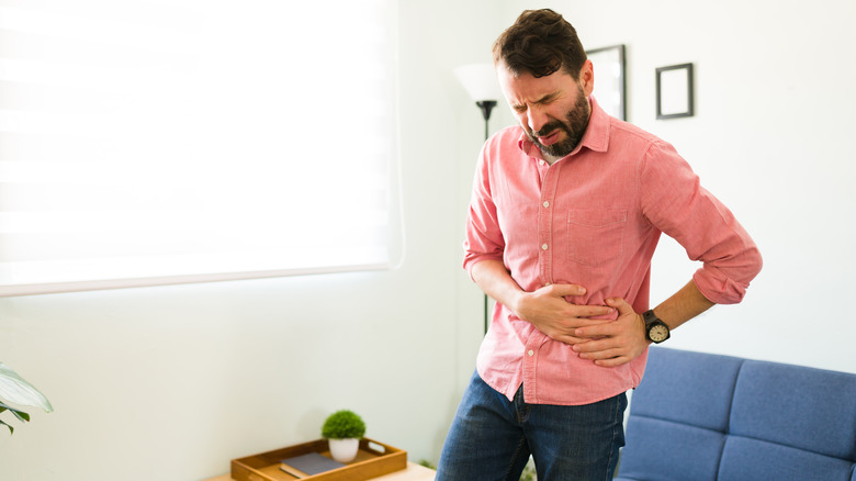 Man in pain due to gallstones