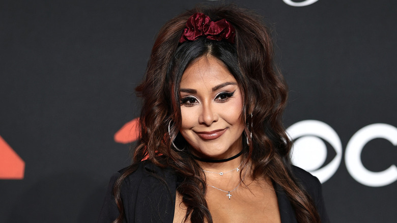 a smiling Snooki from Jersey Shore at an event