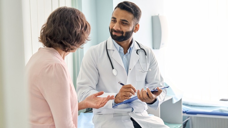 Doctor talking to patient