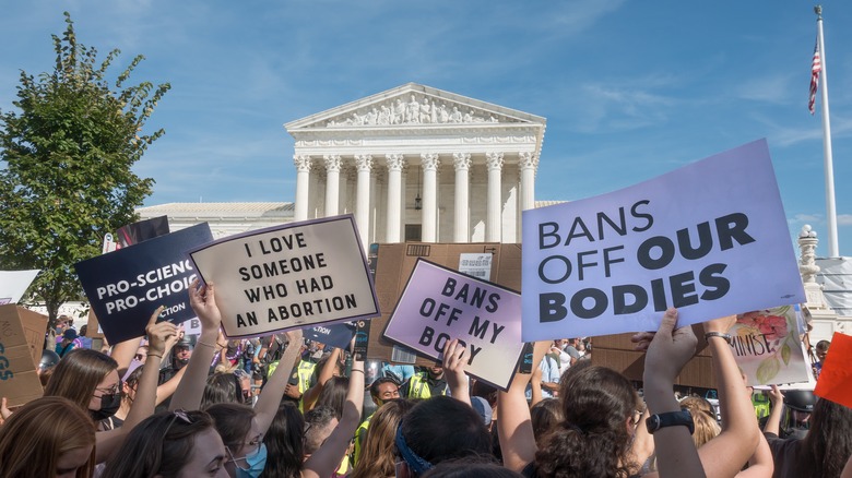 Abortion access protest signs