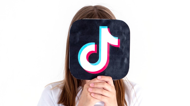 girl with tiktok logo