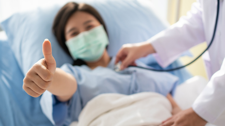 Woman recovering after surgery