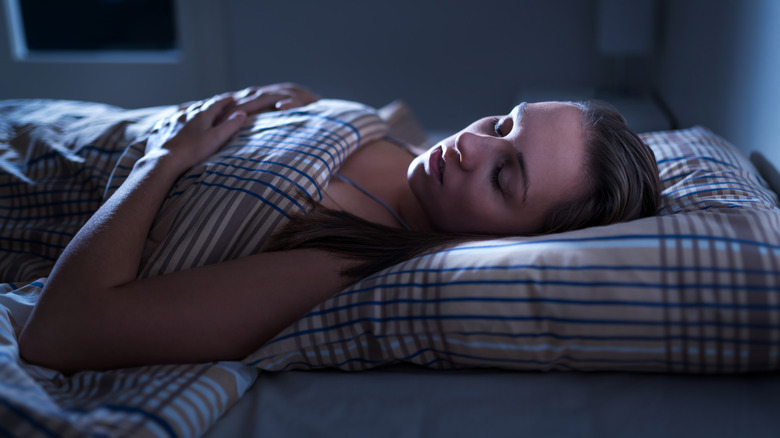 woman resting in bed