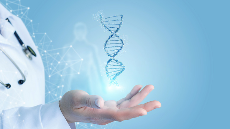 section of DNA in scientist's hand