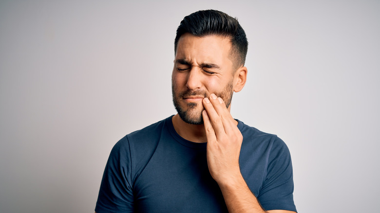 A man has a toothache