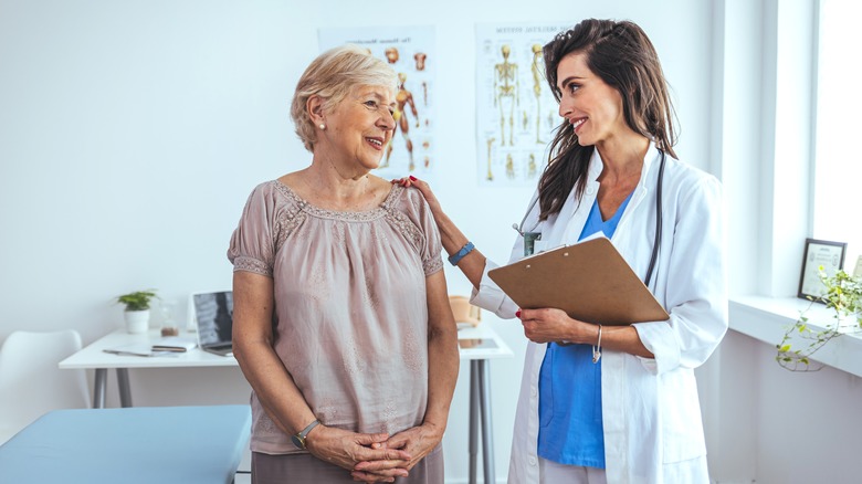 doctor consulting with woman