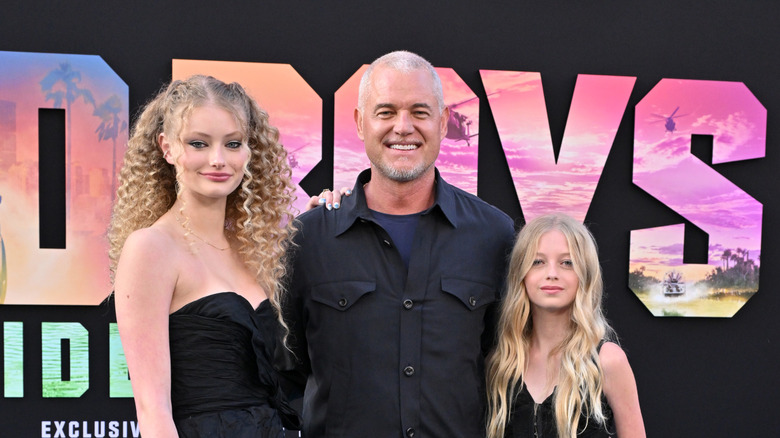 Eric Dane and his daughters smiling
