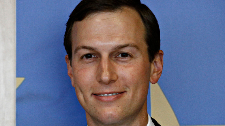 jared kushner smiling in suit