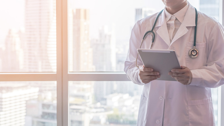 doctor holding clipboard