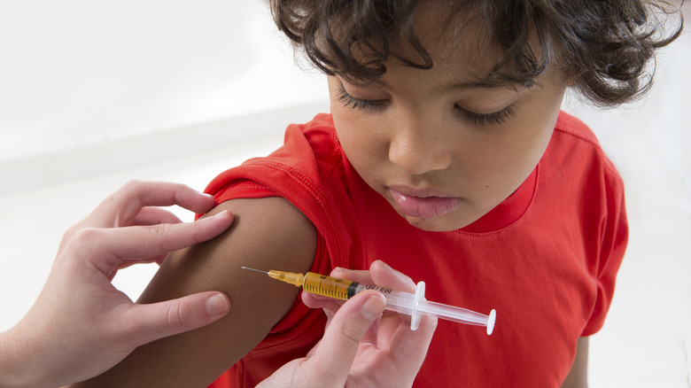 child getting vaccinated