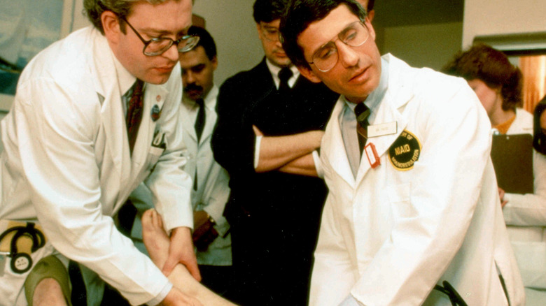 Fauci examining AIDS patient