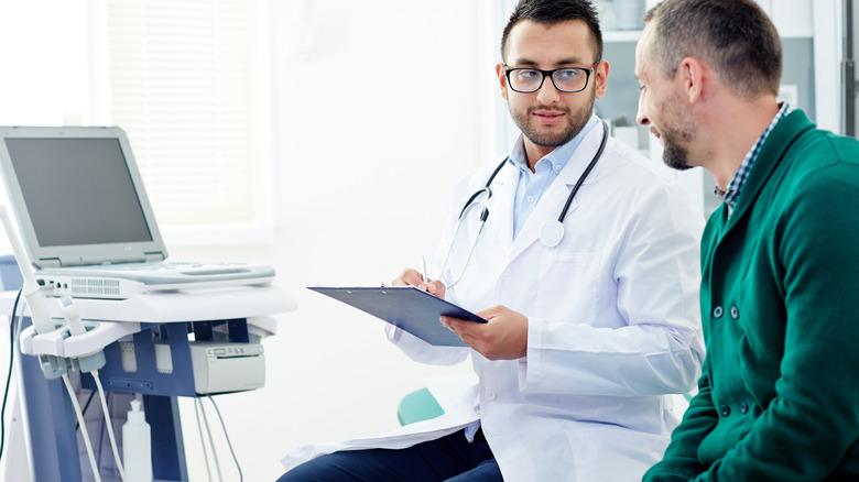 doctor with male patient