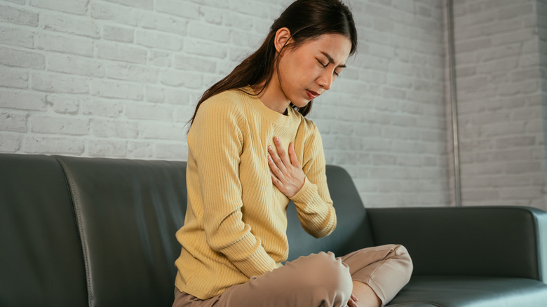 woman holding heart