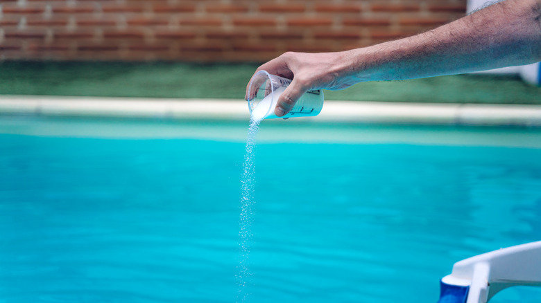 Chemicals being added to pool