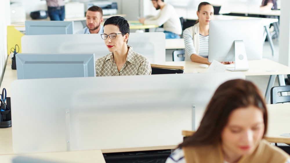working at a seated desk 