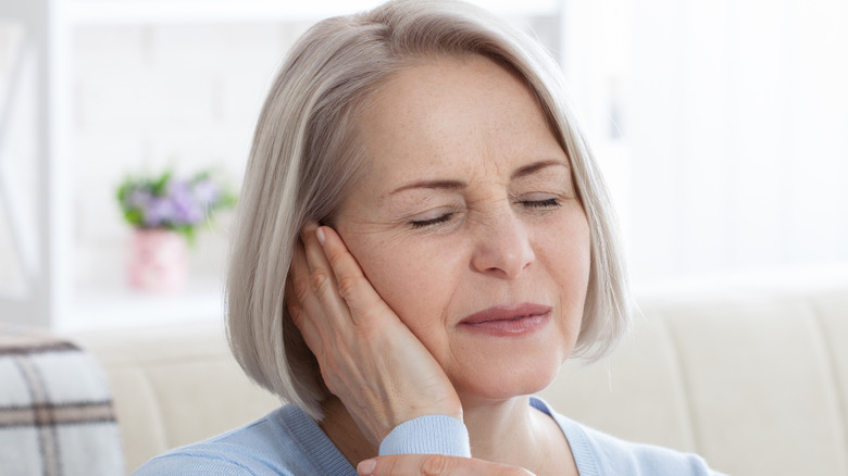 woman with ear infection