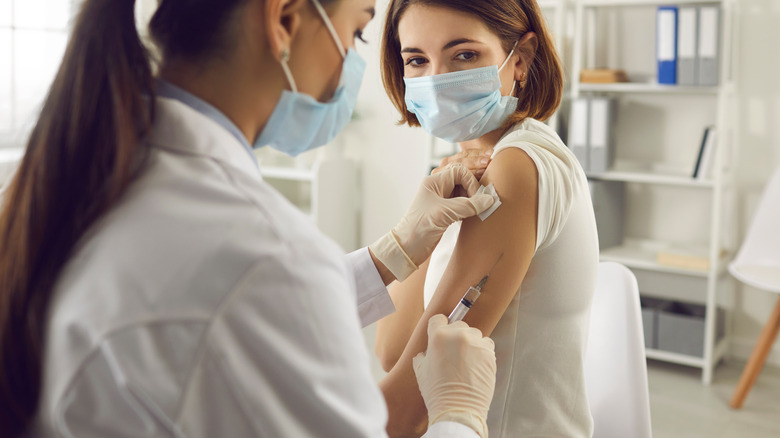 Woman being vaccinated