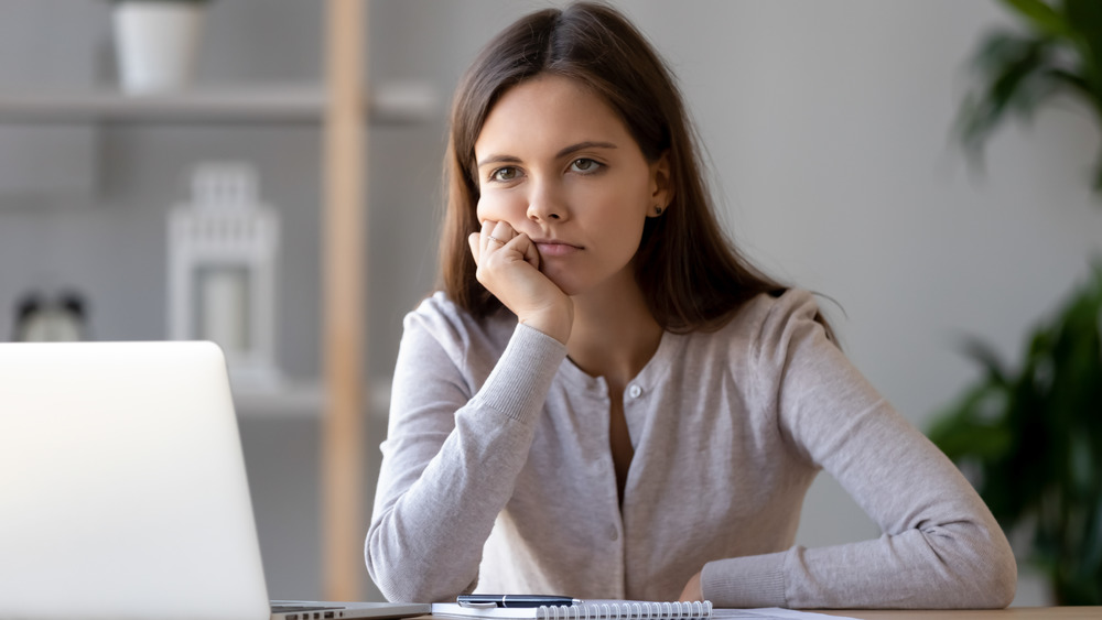 disinterested female suffering from Zoom fatigue