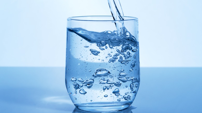 water being poured into glass